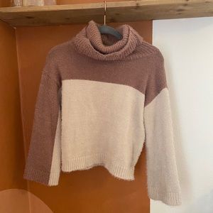 Asymmetrical colored sweater